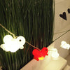 Canar Lichtslinger met 10 silicone Eendjes Wit met Rood